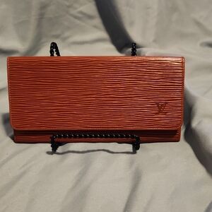 Louis Vuitton Coral Textured Clutch